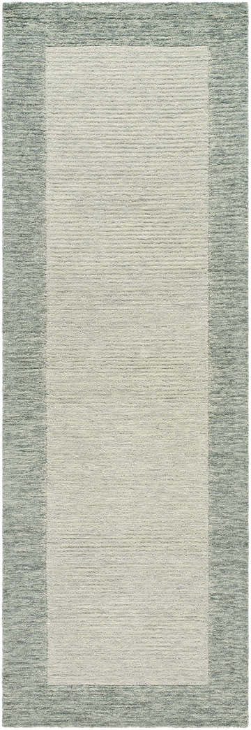 Close-up of the hand-tufted Amadi Green Wool Area Rug; a contemporary rug with a textured border and light center. Design-Runner-268