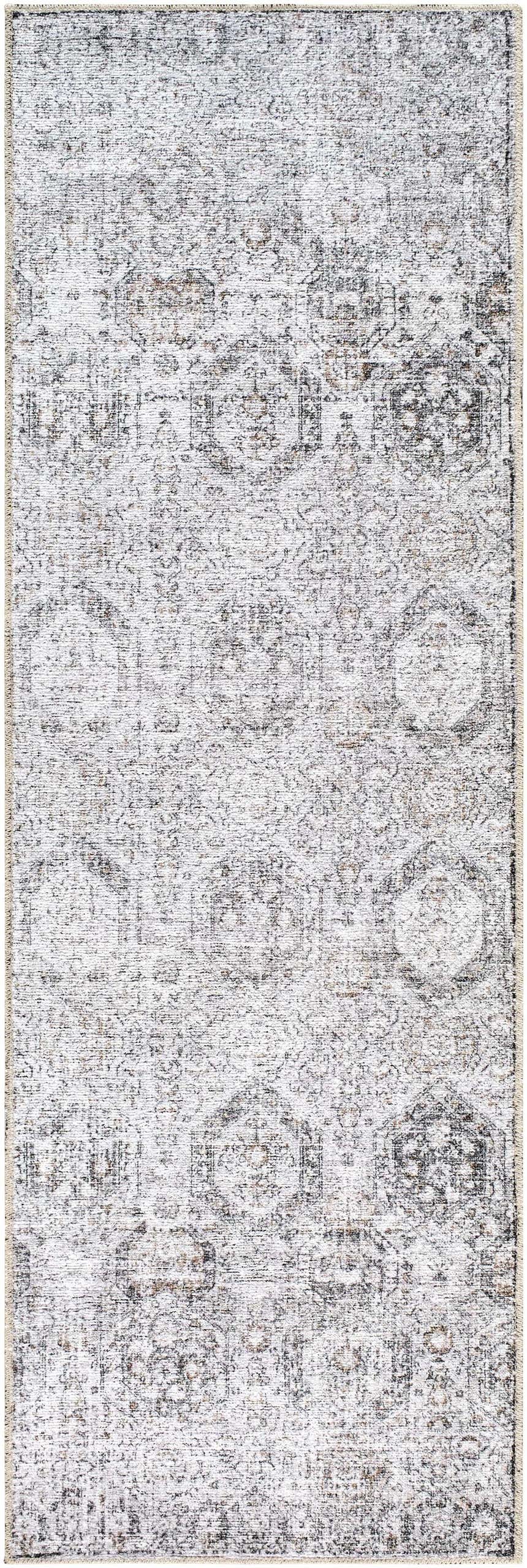 Close-up of the Washable Parkerfield Area Rug. Traditional design in black, gray, and white with a distressed pattern and soft texture. Design-Runner-27710