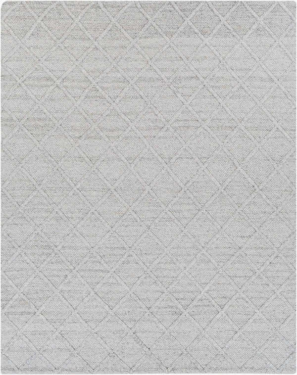 Close-up of the Syosset Area Rug. Charcoal and gray wool rug with a subtle diamond pattern and hand-woven texture. Design-Rectangle