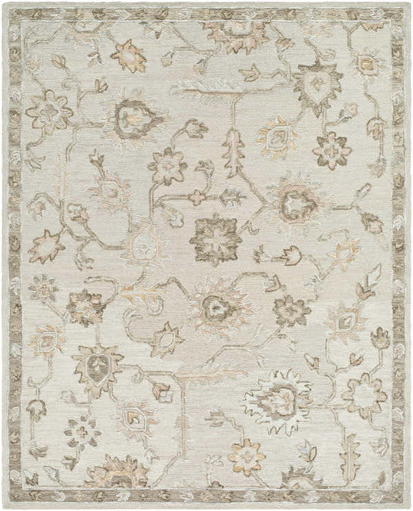 Close-up of the Adelle Tufted Oushak Area Rug. Beige wool rug with a traditional floral pattern in tan and brown. Hand-tufted texture. Design-Rectangle-810