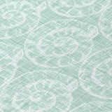 Close up of Dalyn Seabreeze SZ11 Sage Washable Area Rug. Muted sage rug with white seashell pattern. Coastal style.