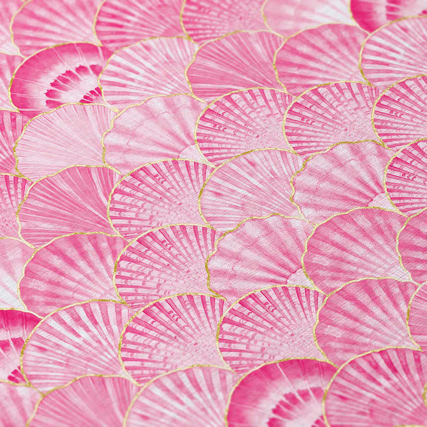 Close-up of Dalyn Seabreeze Blush rug showing pink seashell pattern with gold accents. Coastal style.