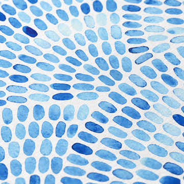 Close-up of the Dalyn Seabreeze Indigo Washable Area Rug, featuring a blue watercolor oval pattern.