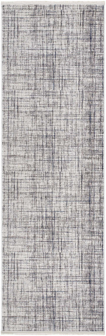 Close-up of the Taysan Area Rug showing a modern, abstract pattern in dark gray, purple, taupe, and mocha. Design-Runner-3270