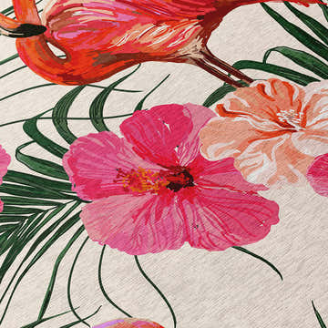 Close-up of the Dalyn Tropics TC12 Ivory Washable Area Rug featuring a flamingo and hibiscus floral pattern.