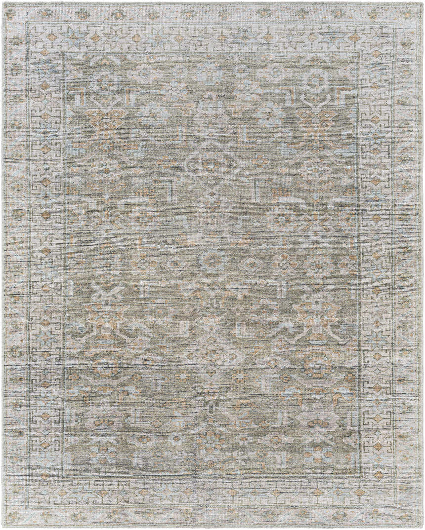 Close-up of the Tisha Washable Area Rug. Farmhouse style rug with traditional patterns in gray, tan, and silver. Design-Rectangle