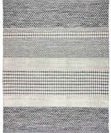 Close-up of the Tideswell Scandi Boho Wool Carpet. Beige rug with black geometric patterns and hand-woven texture. Design-Rectangle