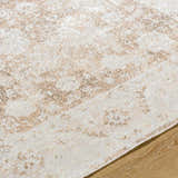 Close-up of the Aniyah Washable Area Rug, showing its ash, pearl, and tan farmhouse pattern and soft texture. Texture