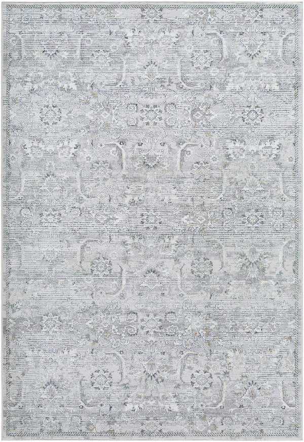 Close-up of the Tariq Area Rug. Machine-woven with a traditional floral pattern in silver gray, slate blue, and sterling gray. Design-Rectangle-537