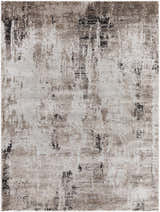 Close-up of the Taszi Luxe Thick Area Rug. Contemporary design with black, ivory, peach, and tan colors. Machine woven texture. Design-Rectangle-537