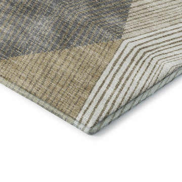 Close-up of the geometric Dalyn Luxury The Reserve TR11 Wheat Washable Area Rug. Chestnut, peach, and taupe tones.