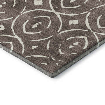 Close-up of the Dalyn Luxury Indoor/Outdoor The Reserve TR12 Brown Washable Area Rug showing geometric beige pattern.