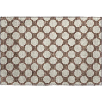 Close-up of the Dalyn Luxury The Reserve TR13 Coffee Washable Area Rug. Beige circles on a coffee-colored background.
