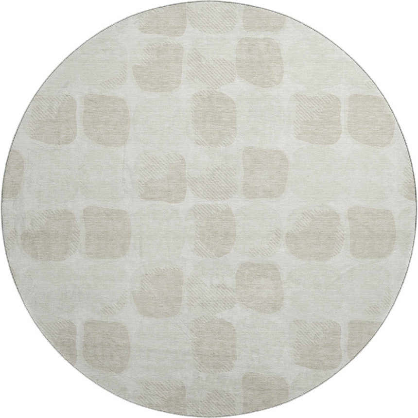 Close-up of round Dalyn Luxury The Reserve TR16 Ivory Washable Area Rug with beige geometric pattern.