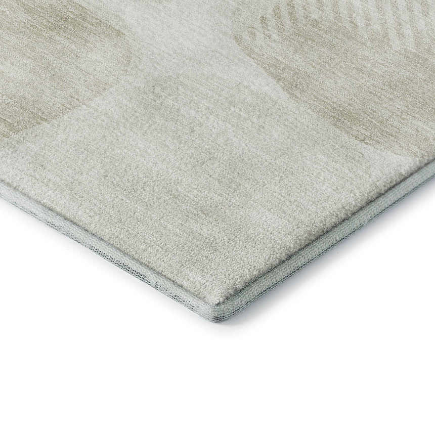 Close-up of the Dalyn Luxury Indoor/Outdoor The Reserve TR16 Ivory Washable Area Rug, showing texture and geometric pattern.