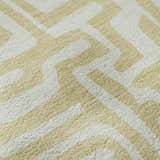 Close-up of Dalyn Luxury The Reserve TR1 Wheat Washable Area Rug. Geometric design in wheat and ivory. Soft texture.