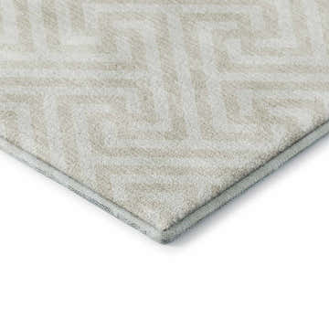 Close-up of the beige Dalyn Luxury The Reserve TR5 rug, showing geometric pattern and soft texture.
