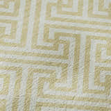 Close-up of Dalyn Luxury The Reserve TR5 Wheat Washable Area Rug. Geometric design in wheat and white. Soft texture.