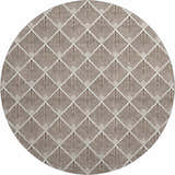 Close-up of the round Dalyn Luxury The Reserve TR9 Brown Washable Area Rug with a geometric fan pattern in beige and dark brown.