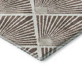 Close-up of the geometric Dalyn Luxury Indoor/Outdoor The Reserve TR9 Brown Washable Area Rug. Beige and dark brown tones.
