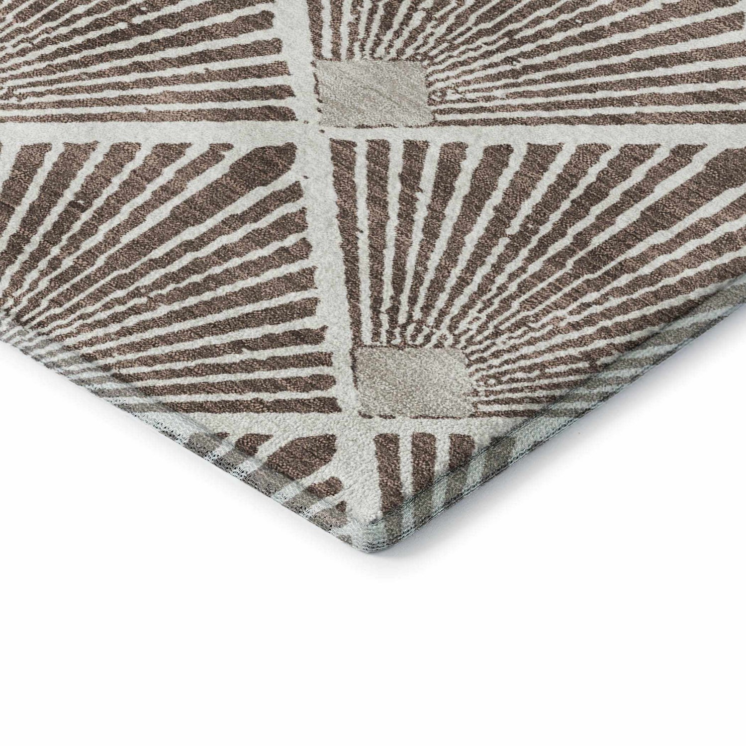 Close-up of the geometric Dalyn Luxury Indoor/Outdoor The Reserve TR9 Brown Washable Area Rug. Beige and dark brown tones.