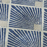 Close-up of Dalyn Luxury The Reserve TR9 Navy Washable Area Rug. Geometric pattern in navy and neutral tones.