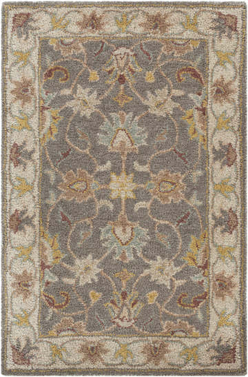 Close-up of the Cherryfield Hand Tufted Taupe Wool Rug, showcasing its floral pattern, texture, and colors: taupe, beige, and yellow. Design-Rectangle-23