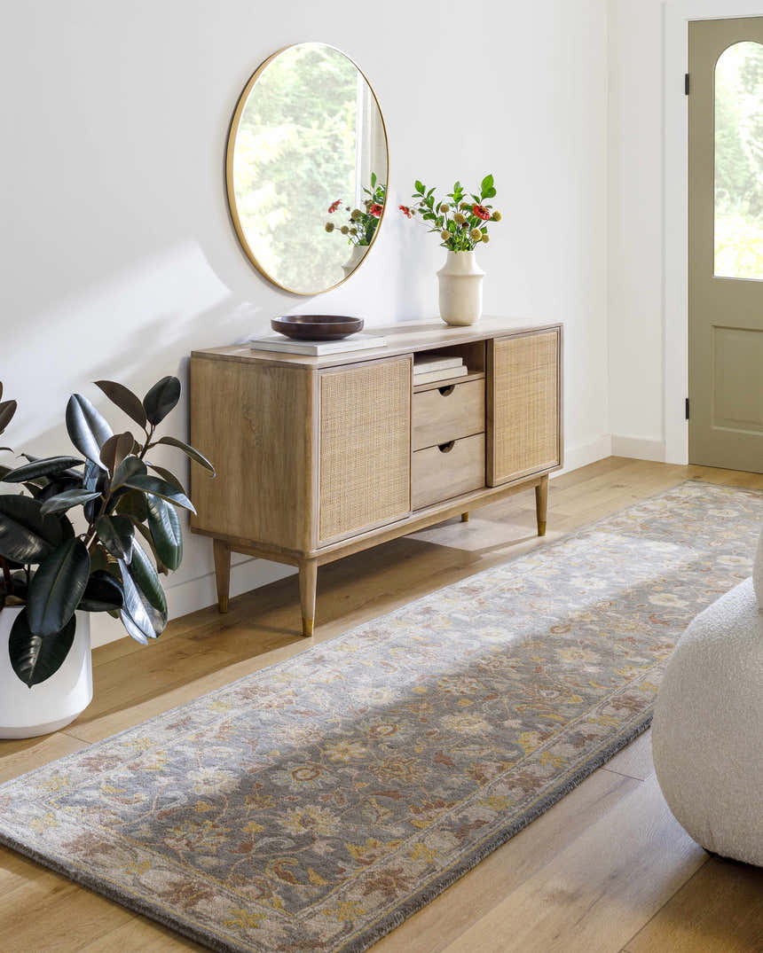 Entryway with Cherryfield Hand Tufted Taupe Wool Rug runner, wood console table, round mirror, and potted plant. Roomscene-Runner
