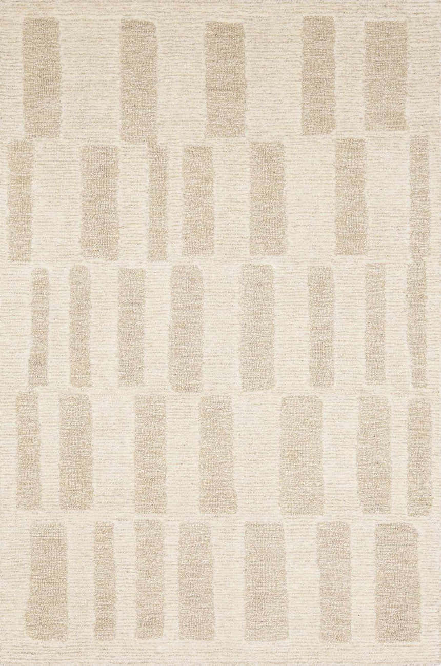 Close-up of the Teige Light Silver Area Rug. Features a contemporary geometric pattern in light silver and sterling gray. Design-Rectangle