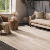 Living room scene with a neutral sofa and the Teige Light Silver Area Rug. Roomscene-Rectangle