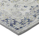 Close-up of the Dalyn Tuscany TU1 Silver Area Rug showing its beige, gold, and blue traditional floral pattern.