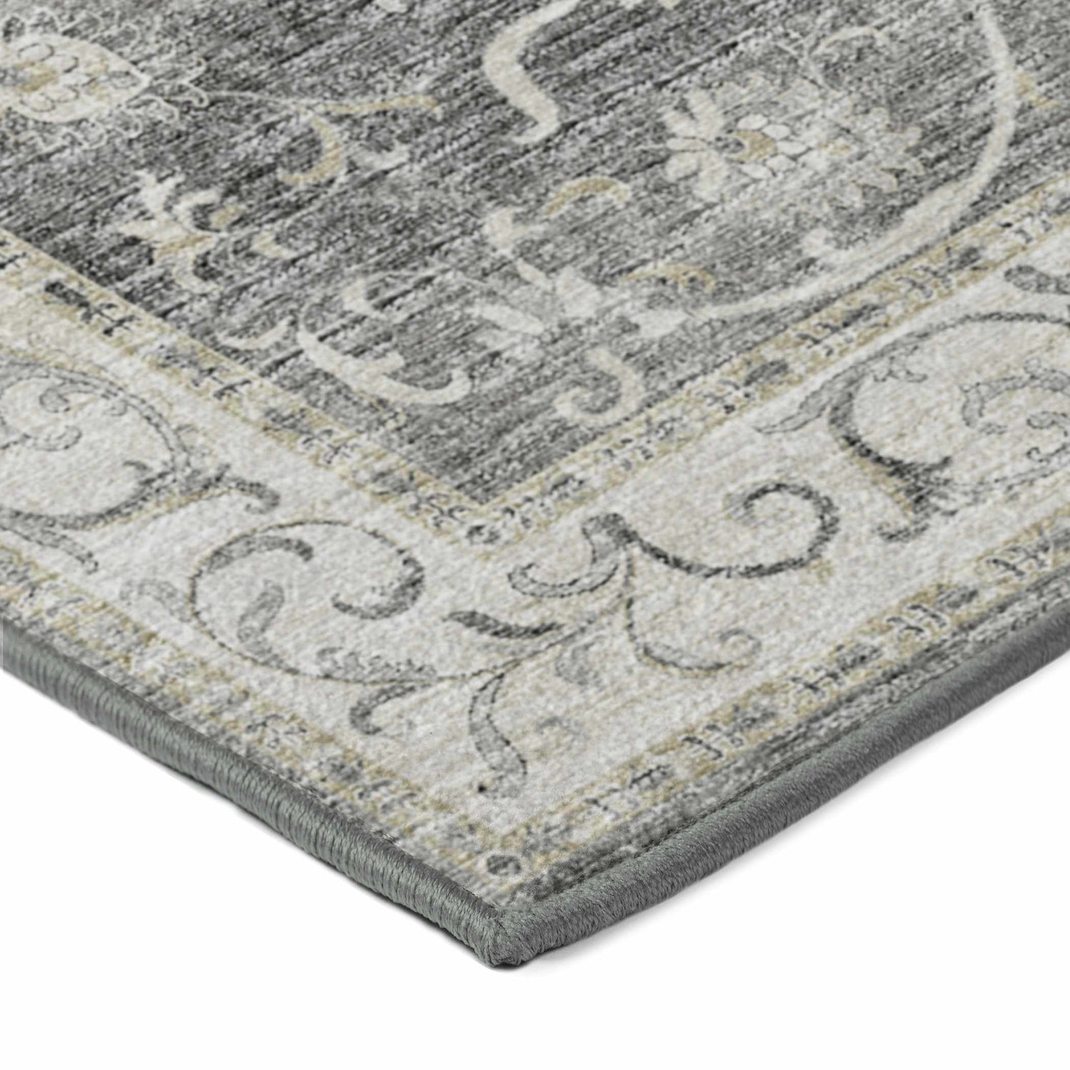 Close-up of the Dalyn Indoor/Outdoor Tuscany TU6 Charcoal Area Rug showing its traditional floral pattern and charcoal, beige, and gold colors.