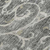 Close-up of the Dalyn Indoor/Outdoor Tuscany TU6 Charcoal Area Rug. Features a beige scroll pattern on a charcoal background.