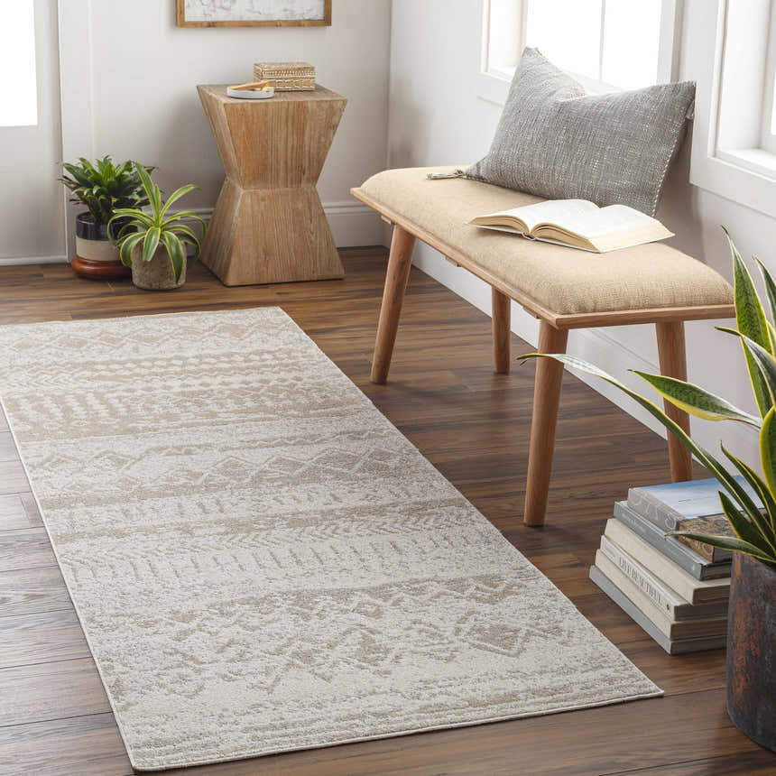 Entryway with a Tupsan Washable Area Rug runner in cream and beige, wood bench, plants, and wood floors. Roomscene-Runner