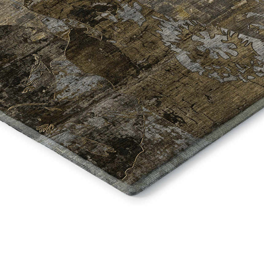 Close up of the mocha Dalyn Luxury Trevi TV15 area rug showing the abstract pattern and color variations.