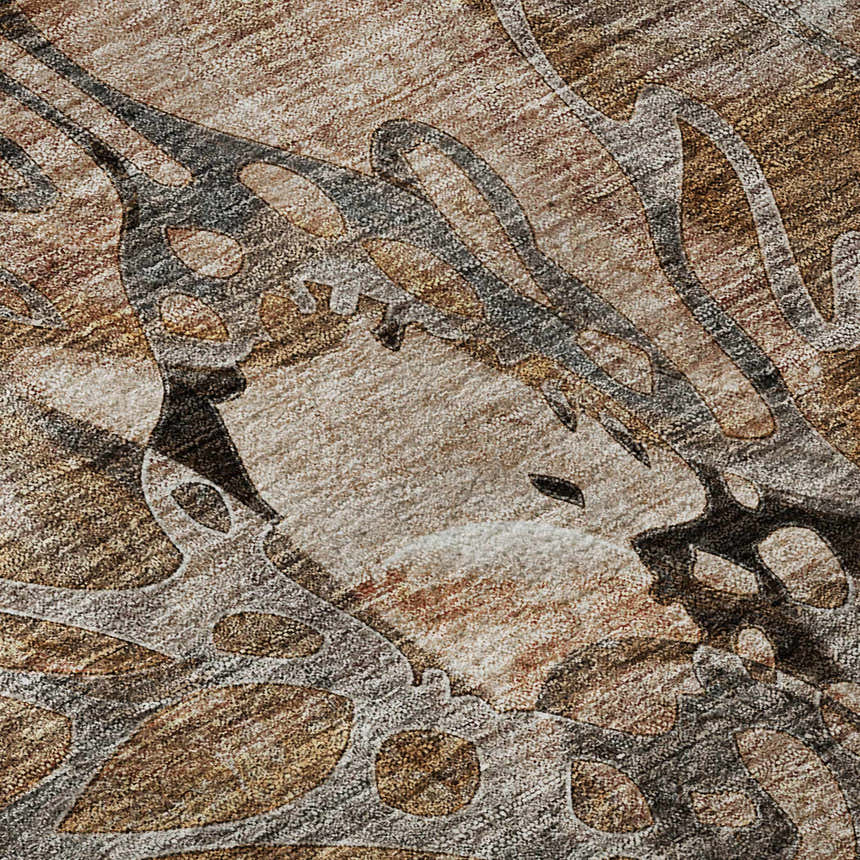 Close-up of Dalyn Luxury Trevi TV17 Paprika Washable Area Rug, featuring beige, caramel, and dark brown abstract pattern.