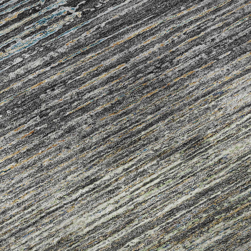 Close-up of Dalyn Luxury Trevi TV1 Granite Washable Area Rug. Features a striated pattern in beige, gray, gold, and light blue.