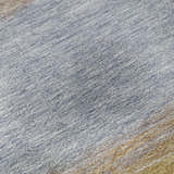 Close-up of the Dalyn Luxury Trevi TV2 Lavender Washable Area Rug. Features a textured pattern in light blue, purple, and gold.