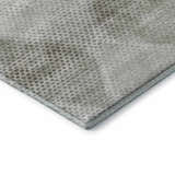 Close-up of the Dalyn Luxury Indoor/Outdoor Trevi TV4 Gray Washable Area Rug with a textured dot pattern.