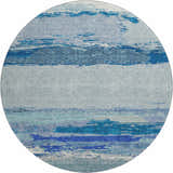 Round Dalyn Luxury Trevi TV8 Blue Washable Area Rug with a watercolor-inspired pattern in shades of denim, teal, and light blue.