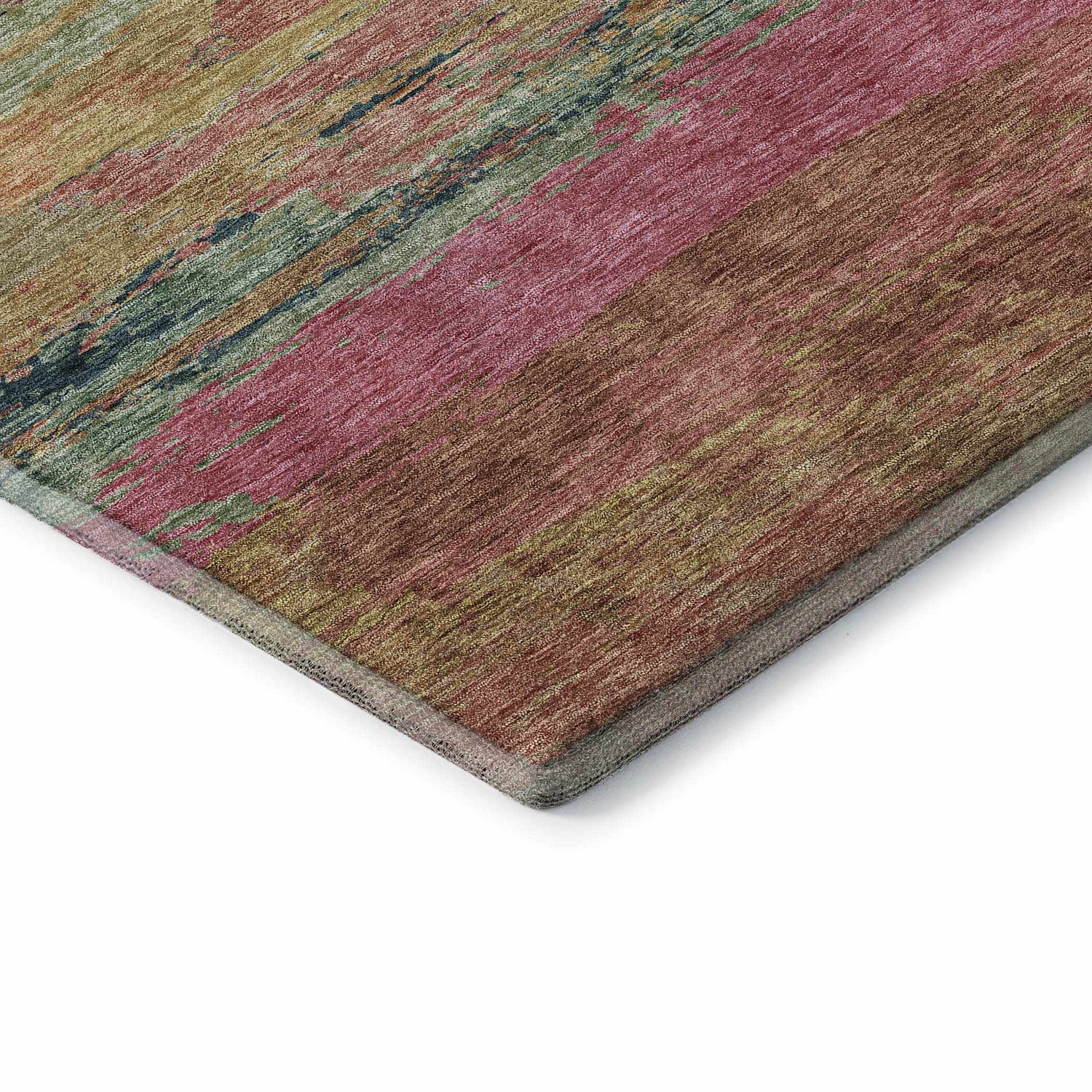 Close-up of the Dalyn Luxury Trevi TV8 Blush Washable Area Rug. Features beige, blush pink, gold, and green stripes.