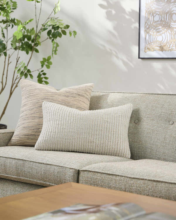 Trory Beige Throw Pillow
