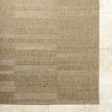 Close-up of the Thana Brown Area Rug showing its woven texture and geometric pattern in camel, tan, and prairie dust. Corner