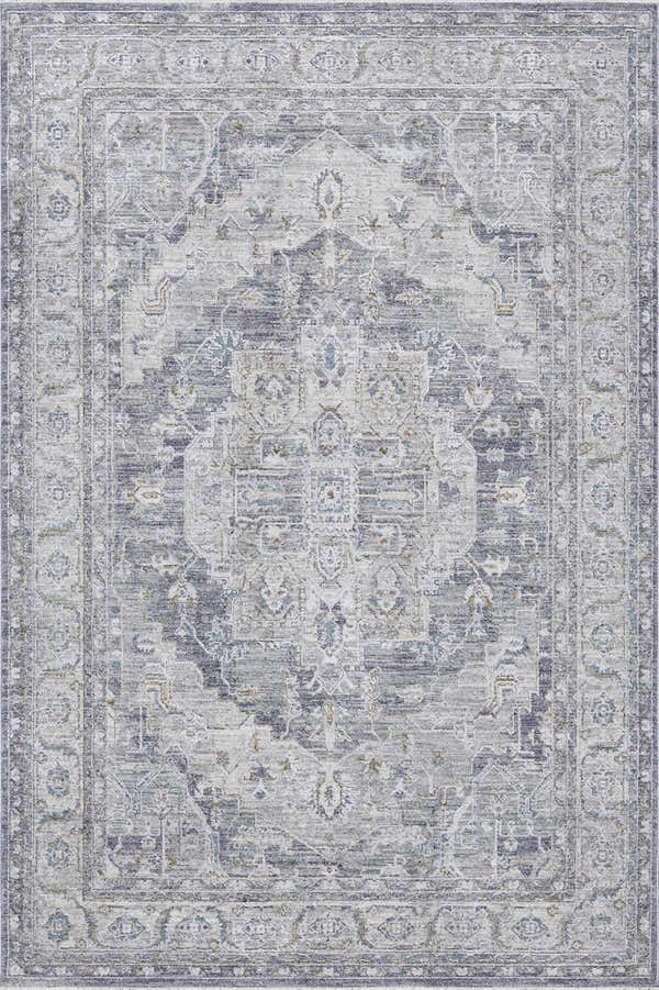 Close-up of the Ulubey Distressed Gray Thick Luxe Area Rug. Features a traditional, oriental pattern in gray, light blue, and beige tones. Design-Rectangle-58