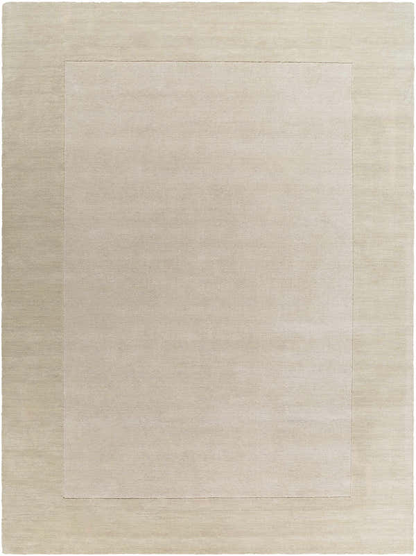 Close-up of a Bordered Solid Wheat Cream Wool Rug, showing the ivory and wheat tones and soft, hand-loomed texture. Design-Rectangle-811