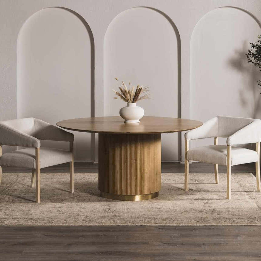 Dining room scene with round wood table and beige Fetscher II Vintage Medallion Area Rug. Roomscene-Rectangle