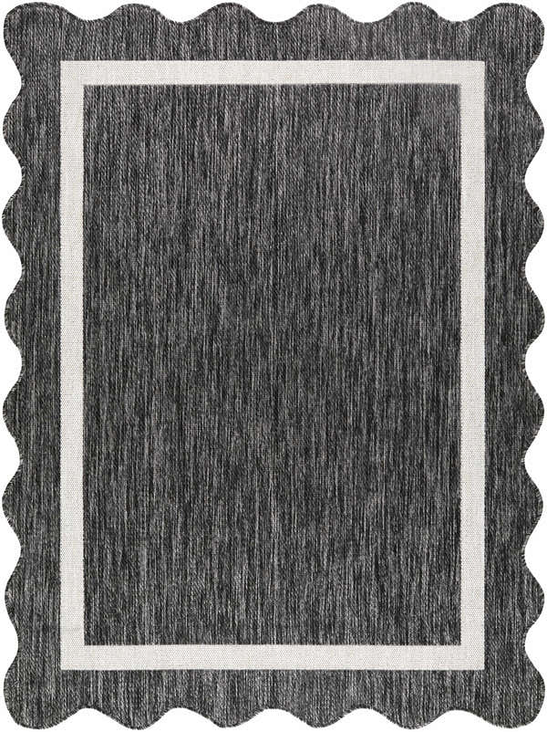 Close-up of the Varro Black Area Rug showing black and cream fibers, cream border, and scalloped edge. Design-Rectangle-537