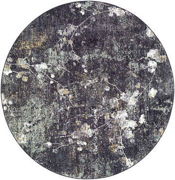 Close-up of the round Aquila Black Area Rug. Features a Southwestern-inspired floral pattern in black, gray, ivory, and tan. Design-Round-53