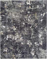Close-up of Aquila Black Area Rug. Southwestern style rug in black, charcoal, gray, ivory, and tan with abstract floral pattern. Design-Rectangle-710102
