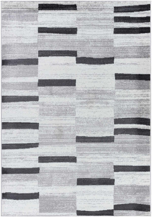Close-up of the Vasso Gray Area Rug featuring a contemporary block pattern in ink, silver gray, and light silver. Design-Rectangle-5373